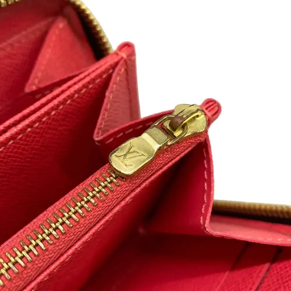 Louis Vuitton Zippy Wallet Monogram Ramage Long Wallet M60927 Grenade Coral